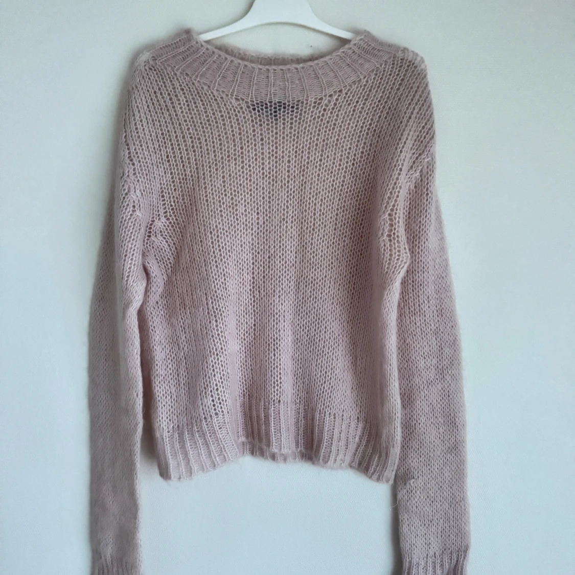 Ljusrosa stickad tröja från Lieblingsstück