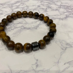 Brunt pärlarmband  - Helt nytt arband 