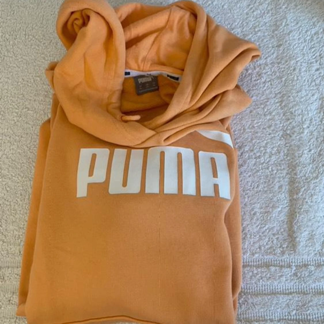 Orange hoodie från Puma
