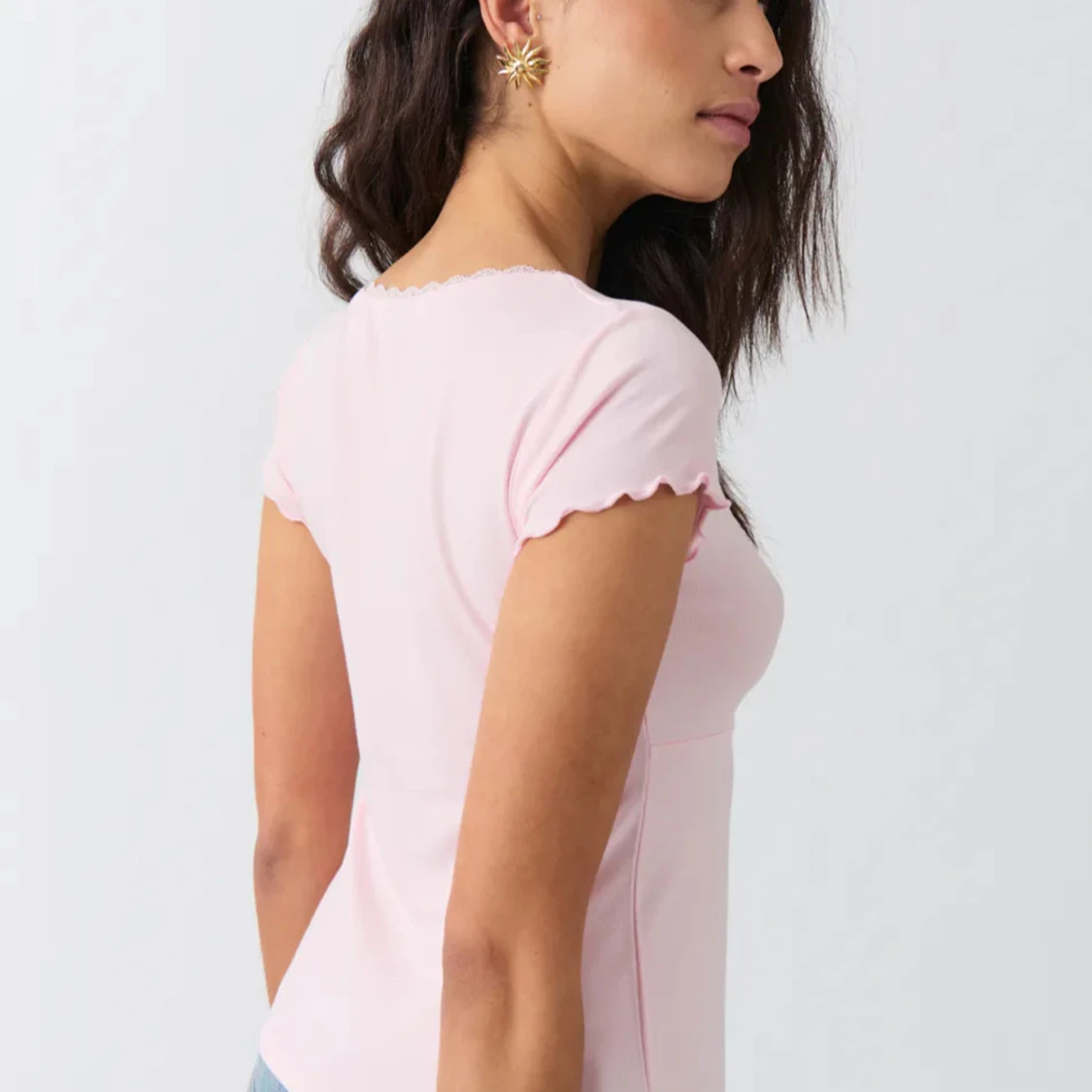 Rosa topp med volangdetaljer - 90