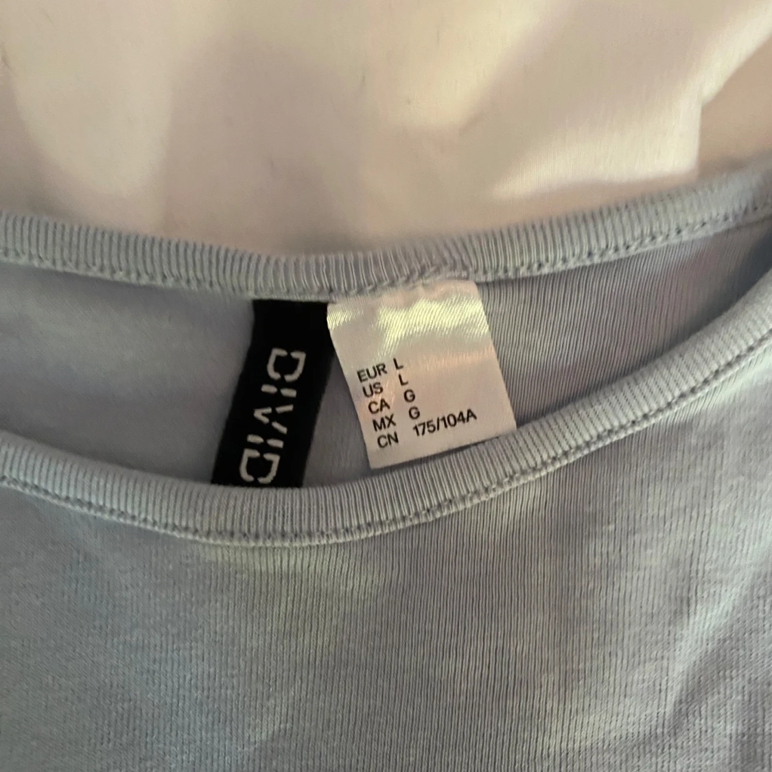 Blå t-shirt med cowboytryck från Divided - 91