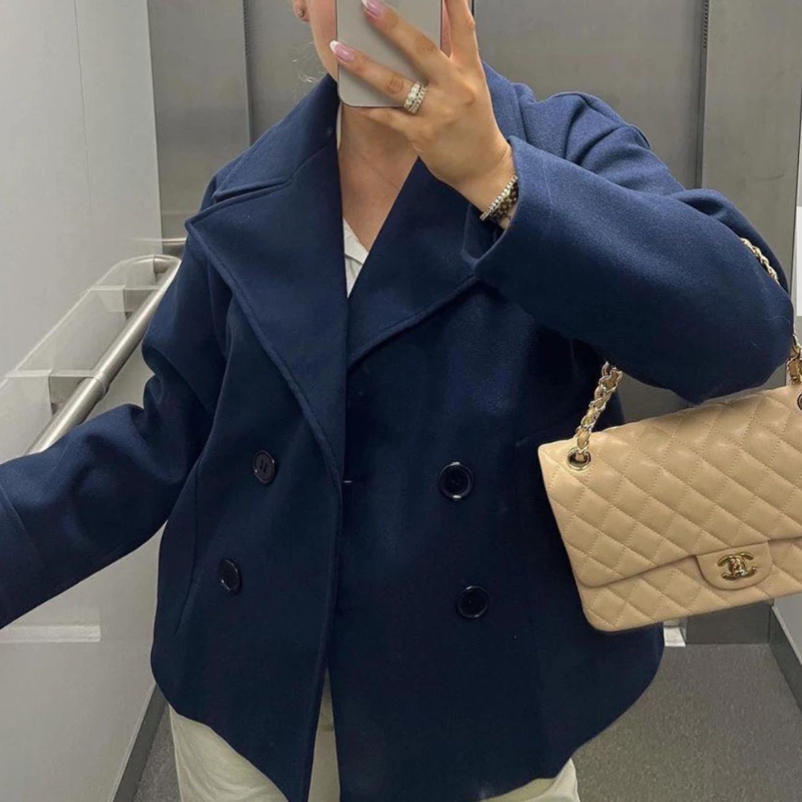 Blå Kappa från Design by Si den e lite nopprig annars inga problem! - 90