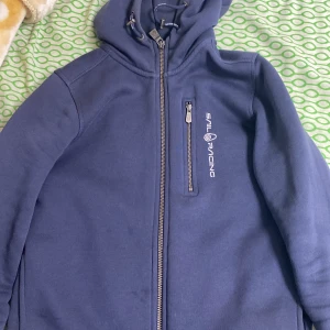 Sail racing jacket blue (used) - Size 150 for men and women. I washed it so its clean. And there are no Holes in it.