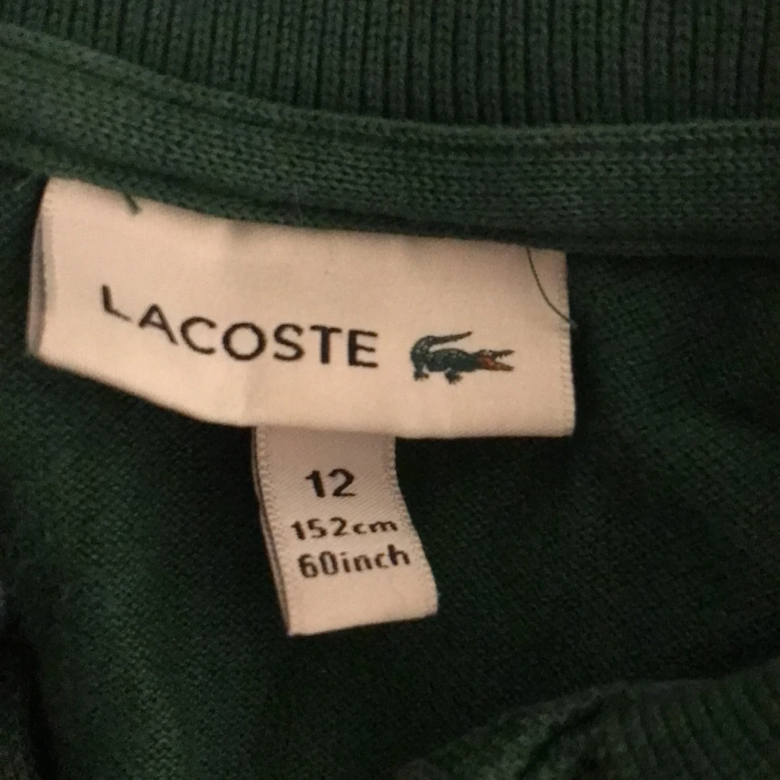 Grön pikétröja från Lacoste - 91