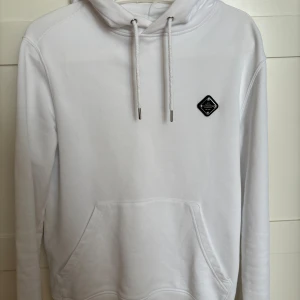 J.Lindeberg hoodie  - Sjukt snygg vit J.lindeberg hoodie i väldigt bra skick! Storlek S Skriv vid mer info!