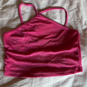 Rosa glittrig topp - En jättefin rosa topp som tyvärr aldrig kommer till användning. Nyskick 