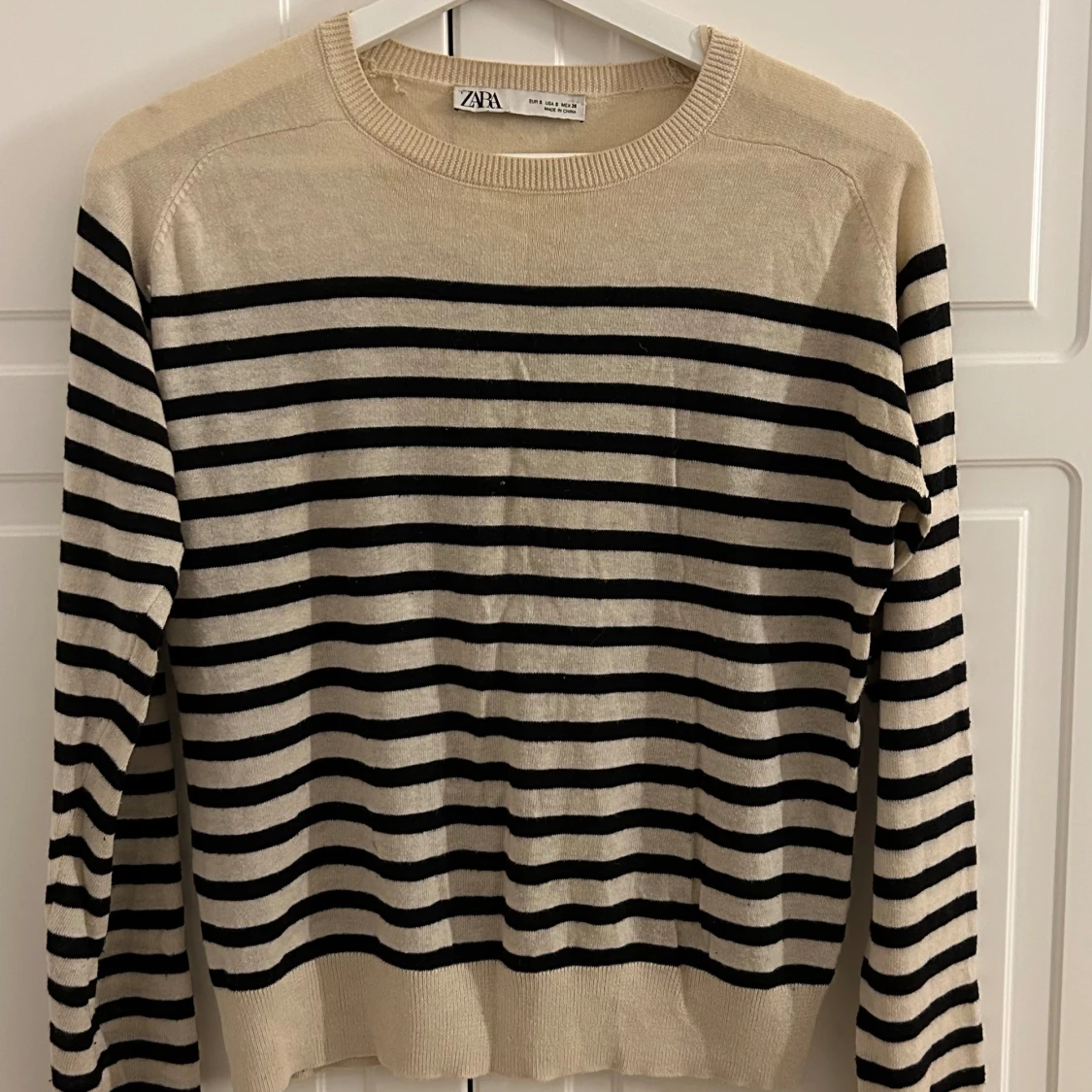 Stickad randig tröja