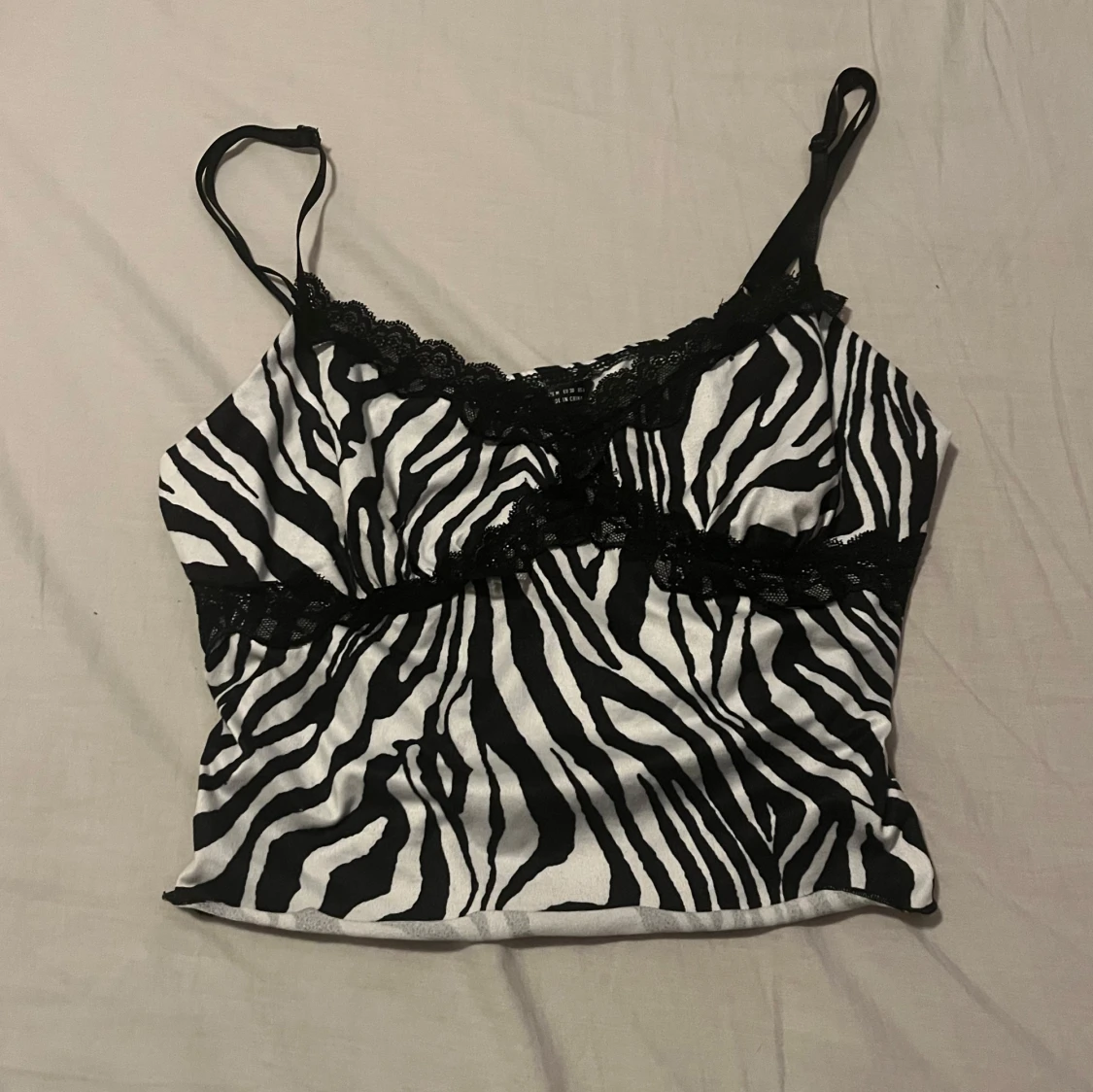 Vit zebra topp.