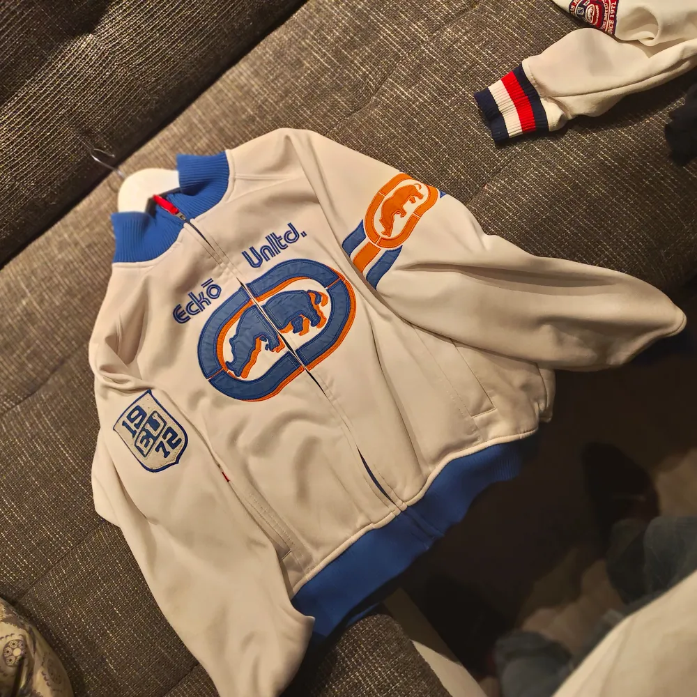 Very rare vintage Ecko UNTLD varsity jacket/tracksuit top. Hoodies.