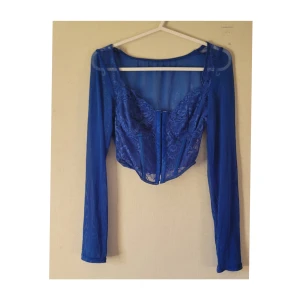 Korsett tröja - Mer djupblå än bilden visar