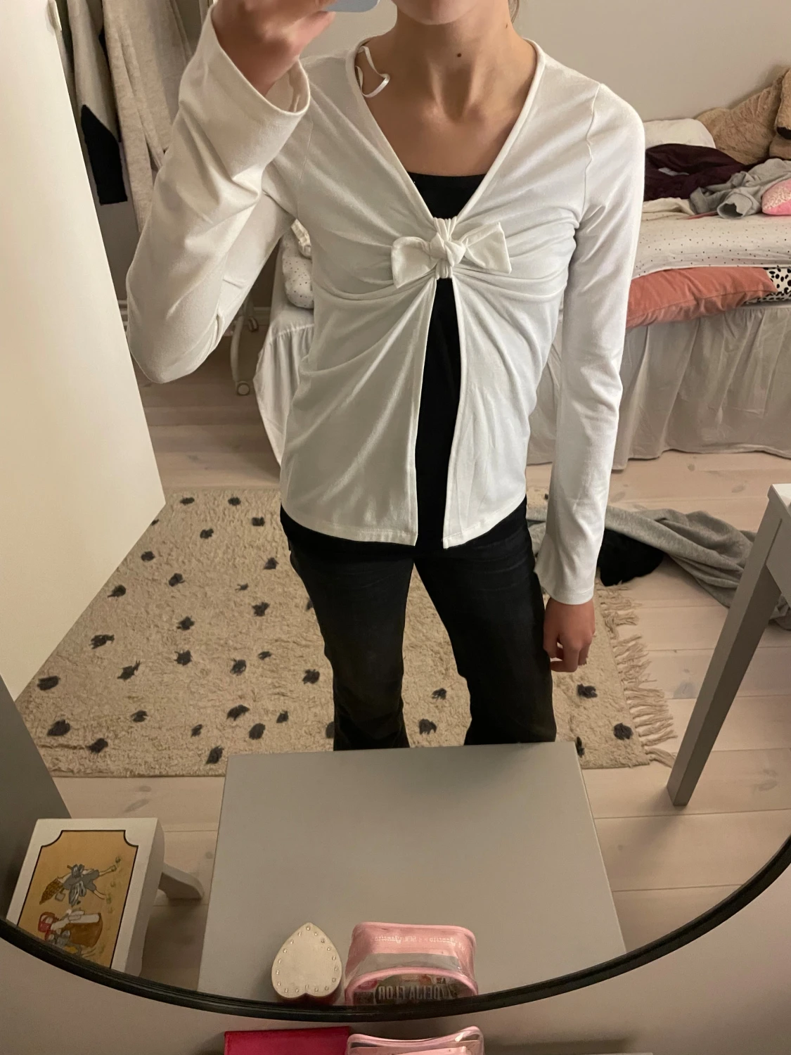 Vit tröja med rosett från H&M