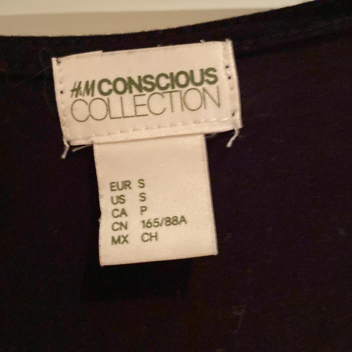 Svart topp med v-ringning H&M S - 2