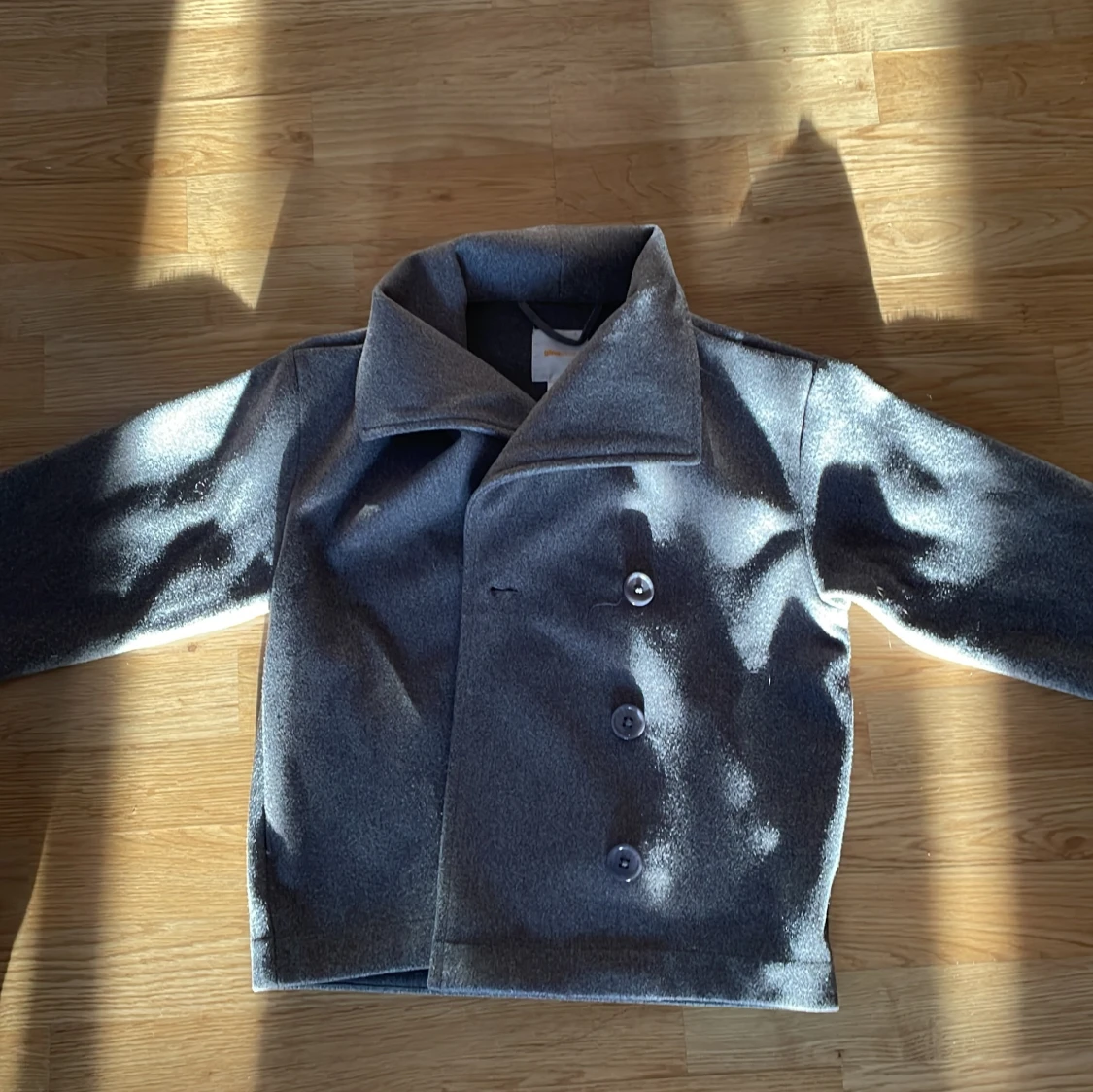 Grå skepparkavaj från Gina Tricot