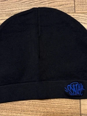 Syna world mössa - Syna world mössa helt ny, snabb leverans 