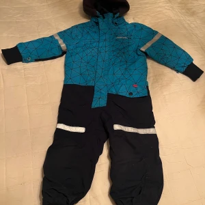 Overall Didriksons - Overall i fint skick, blå med mönster, märke Didriksons. 