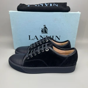 Lanvin Dbb1 Nappa Cap Toe Sneaker Navy - • The shoes have been worn 2–3 times and are in like-new condition  • Size: EU40 / UK6 (fits 41)  • Color: Navy  • Retail price: 5000 SEK / 450€  • Box & dustbag is included