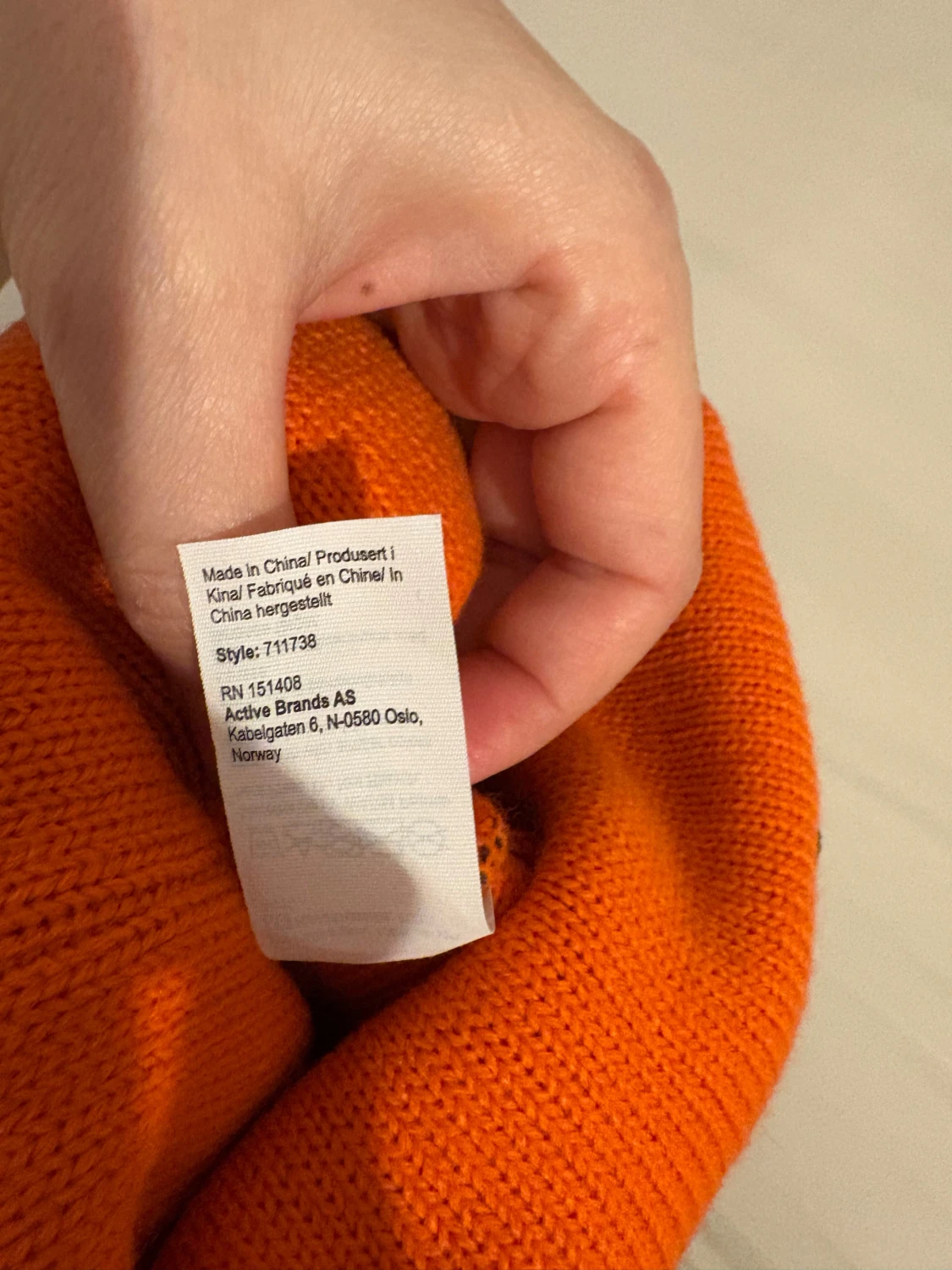 Randig mössa från Bula i orange och marinblå - 2