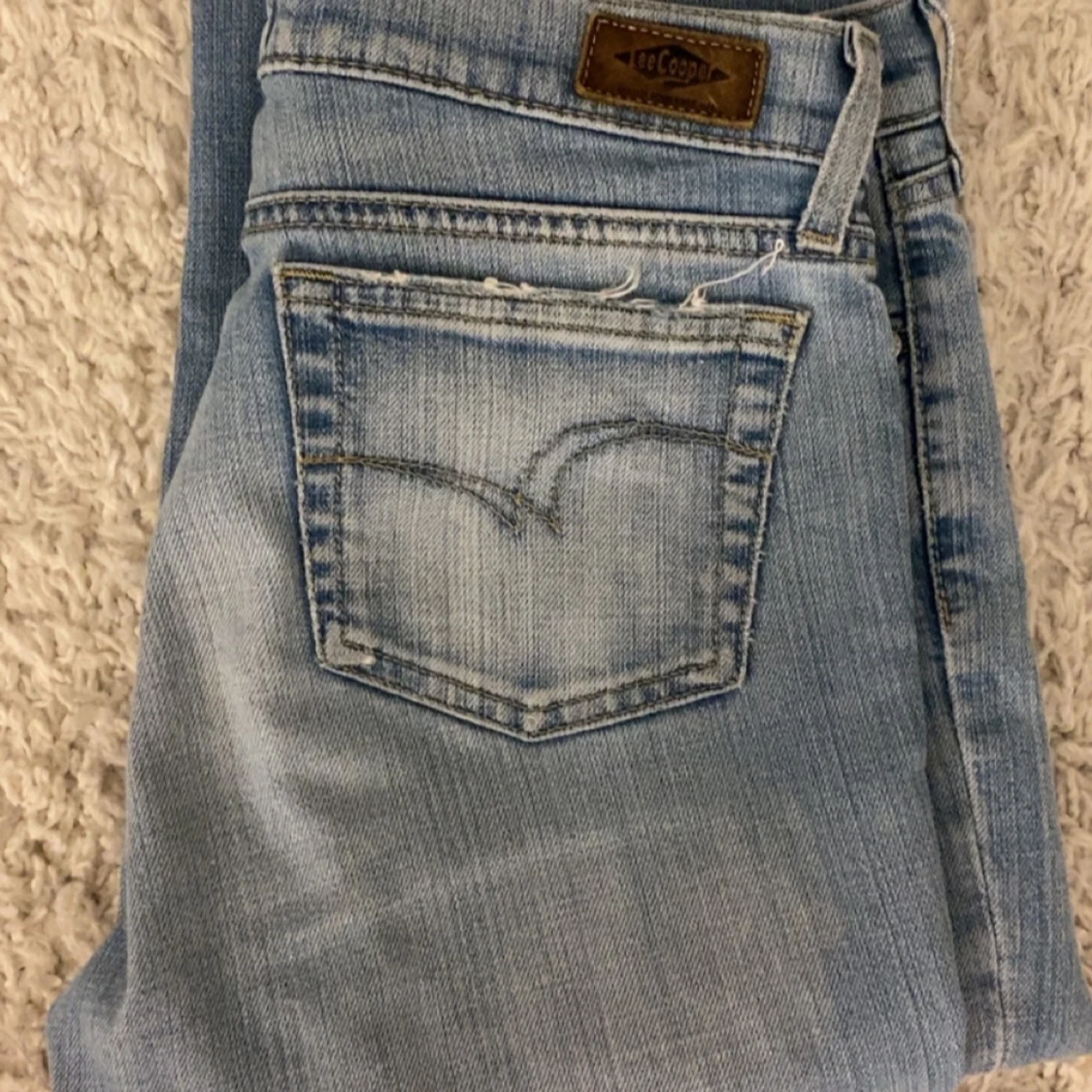 Lågmidjade ljusa bootcut - 1