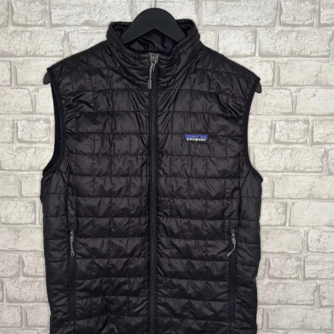 Svart quiltad dunväst från Patagonia