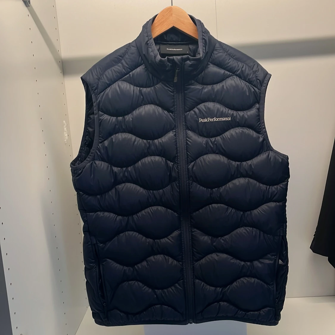 Mörkblå dunväst Peak Performance