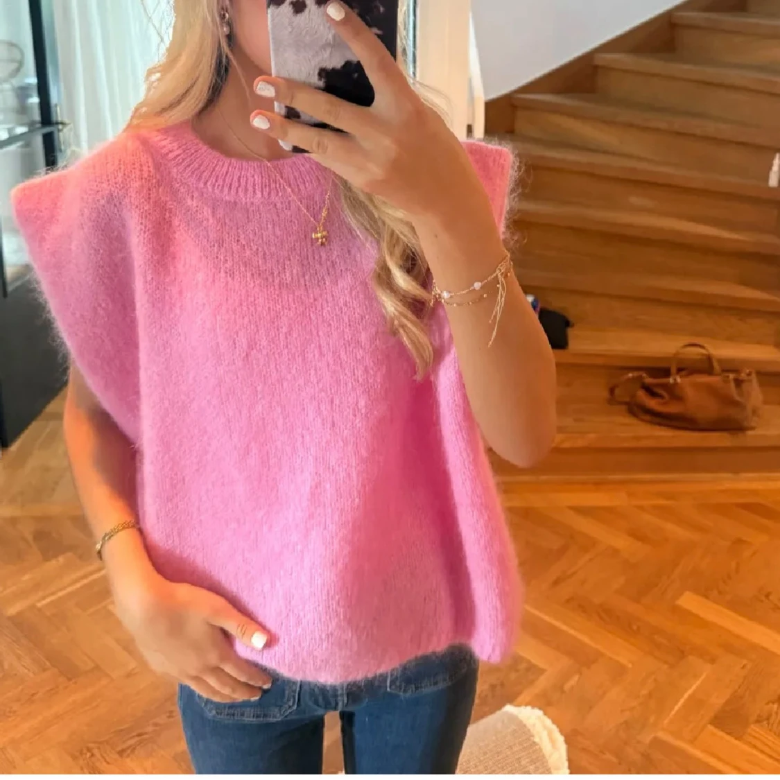 Ljusrosa stickad väst