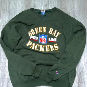 Champion NFL sweatshirt  - Mörkgrön vintage sweatshirt från champion