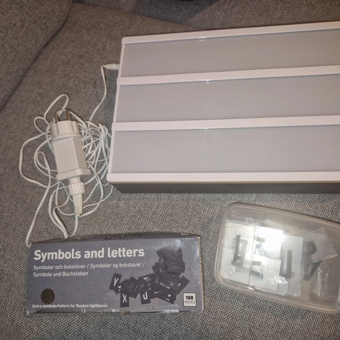 Lightbox med bokstäver och symboler