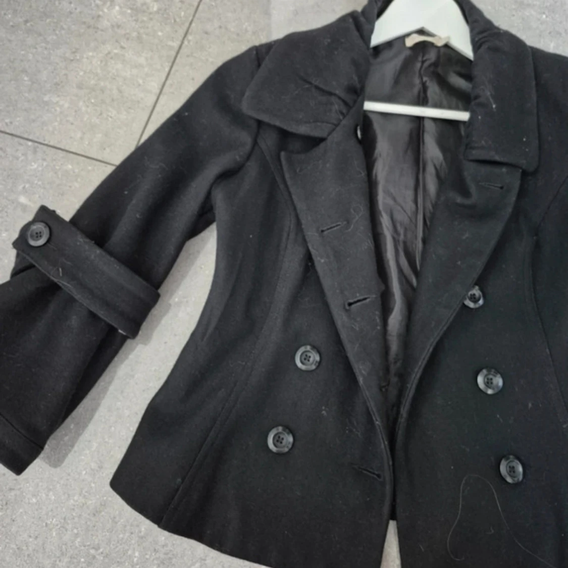 Svart skepparkavaj med stora ärmar