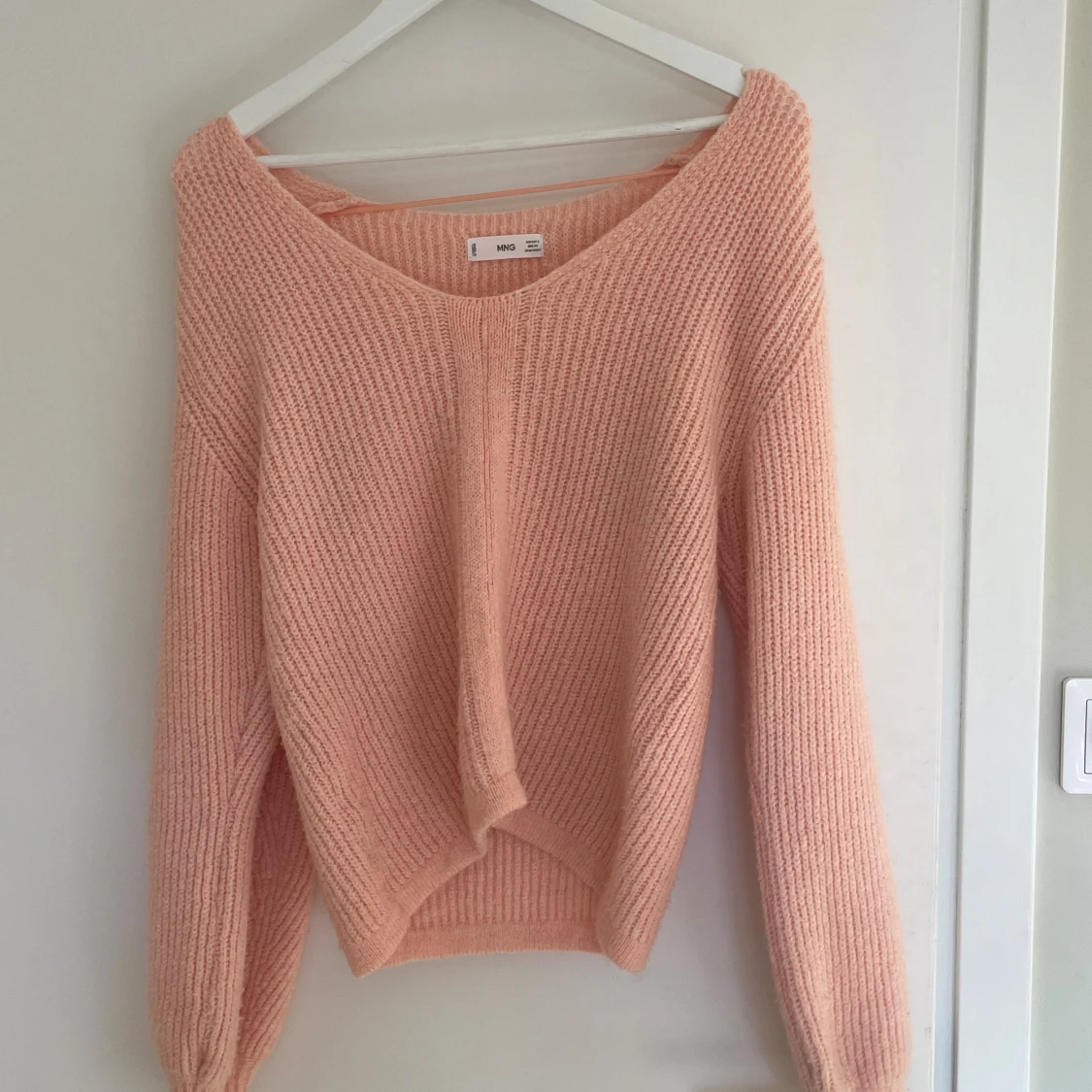 Ljusrosa stickad tröja från Mango