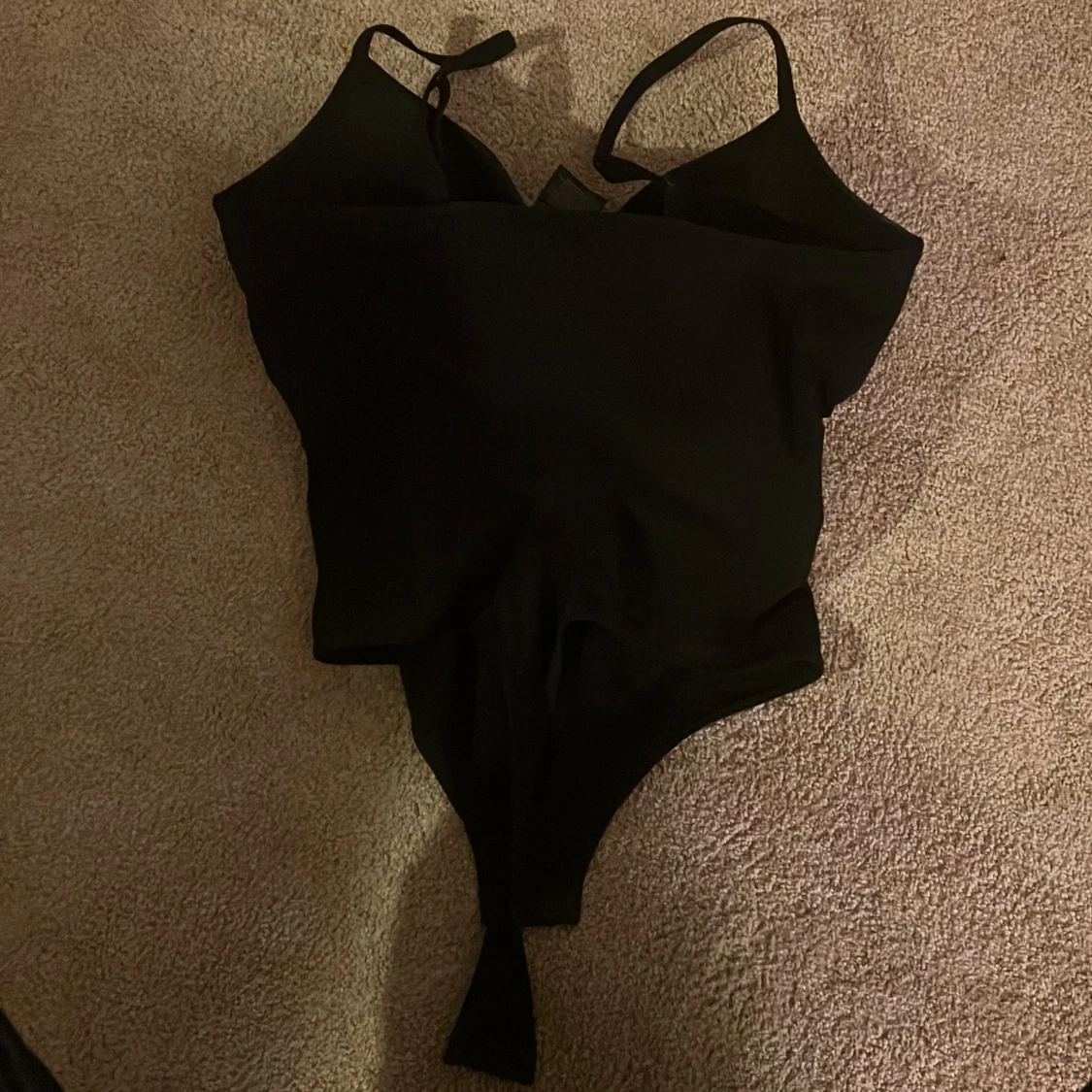 Svart bodysuit från H&M, storlek L - 1