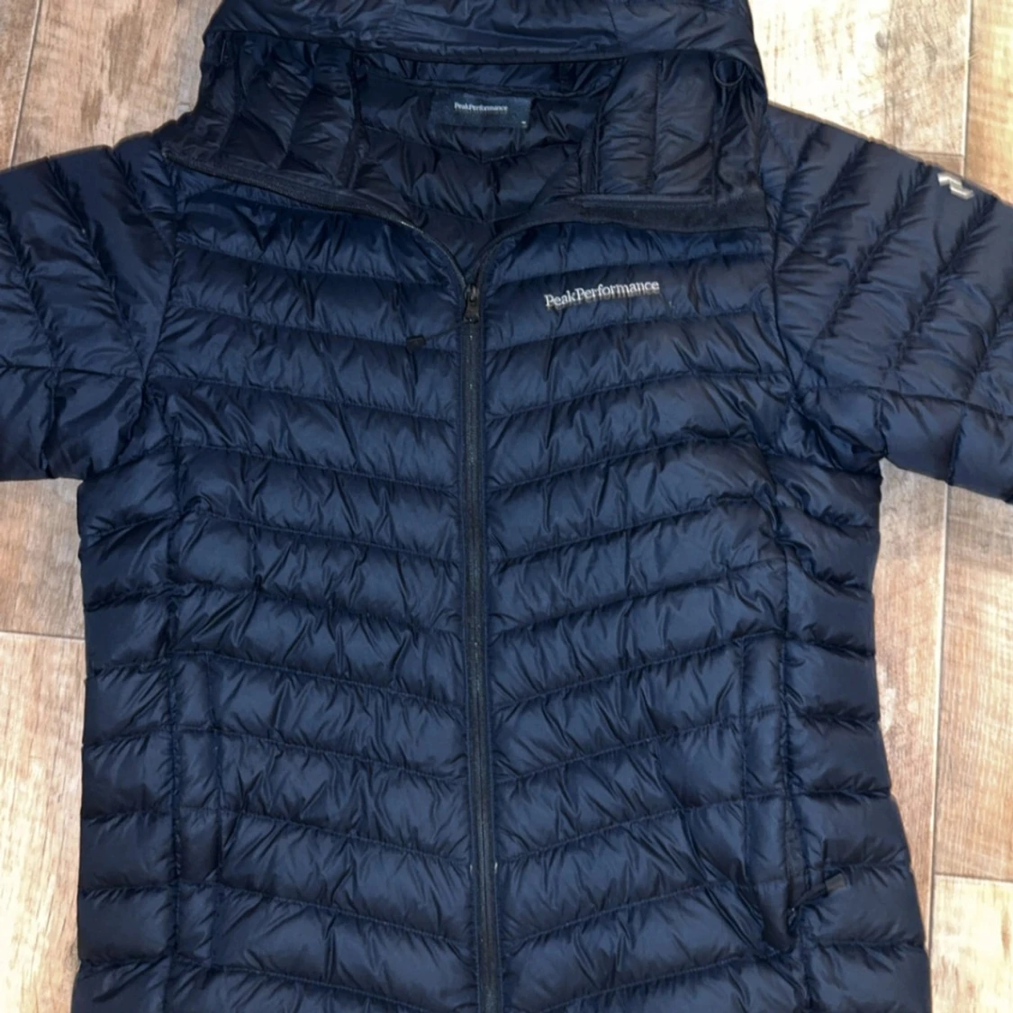 Mörkblå dunjacka Peak Performance