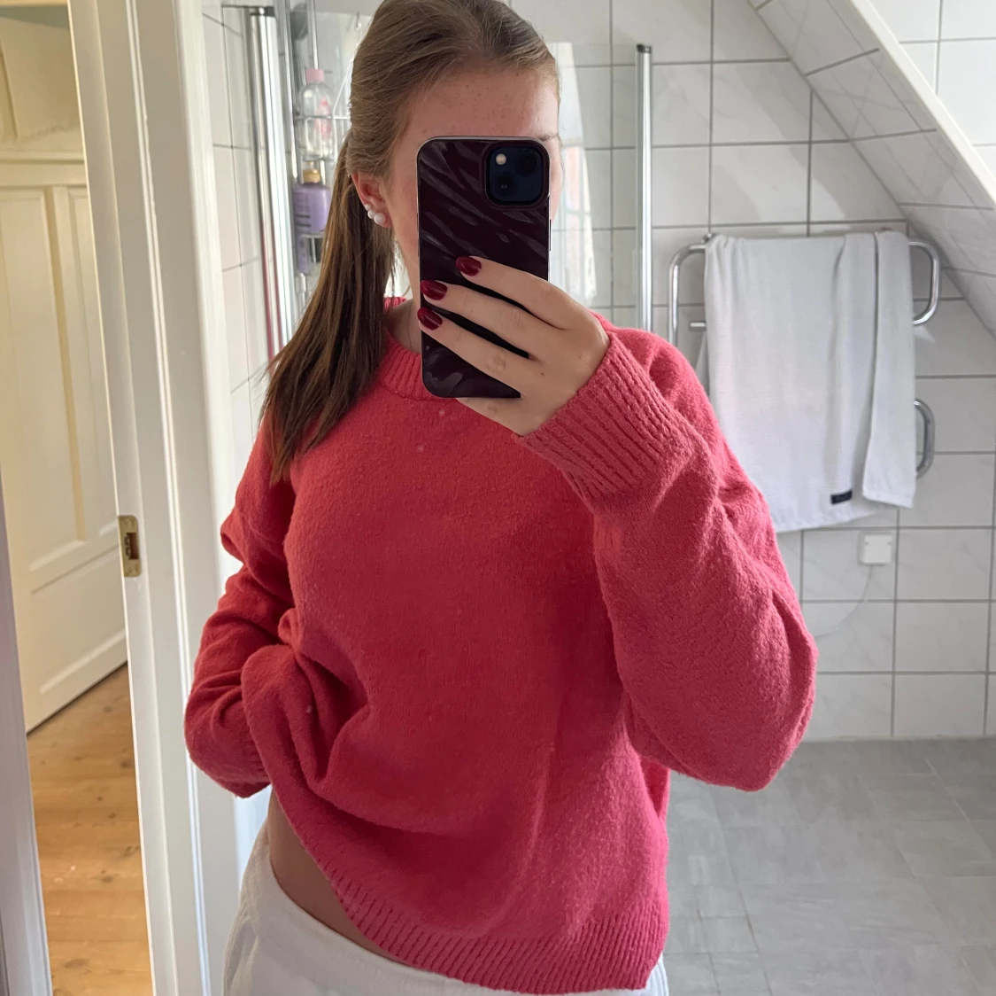 Rosa stickad tröja med rund hals