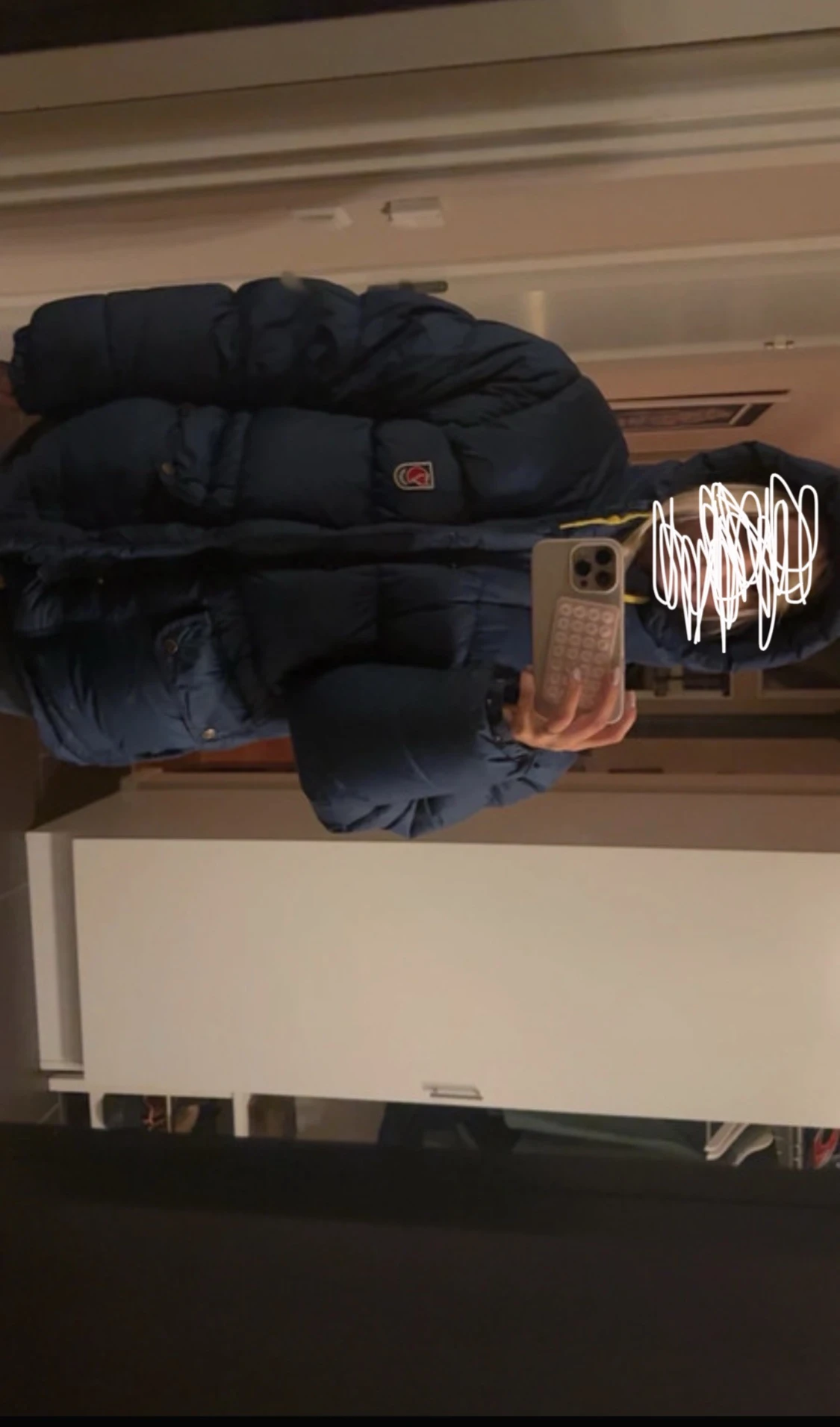 Blå dunjacka från Fjällräven