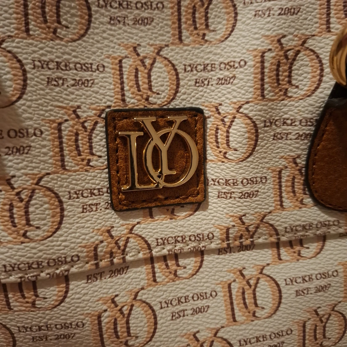 Lycke Oslo beige handväska med logomönster - 1
