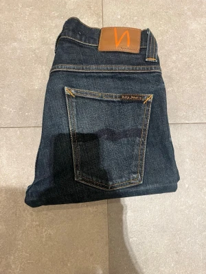 Nudie grim Tim - Tjena, säljer nu dessa riktigt snygga nudie grim Tim i Stl W32 L32 . Dom är i riktigt bra skick. Nypris 1600✅Vid minsta funderingar så är det bara att höra av sig//Allt gott