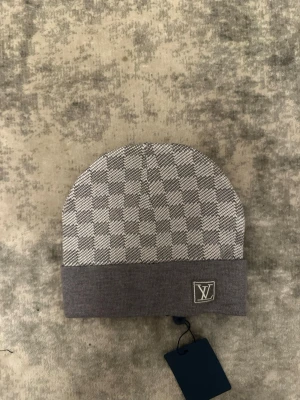 Grå mössa - En grå mössa perfekt för vintern