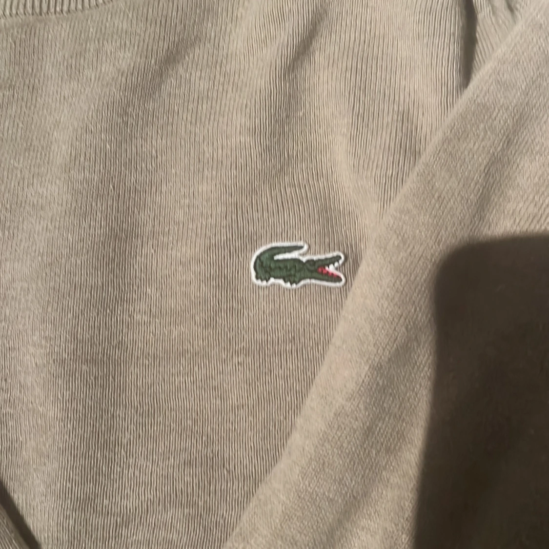 Beige tröja från Lacoste - 1