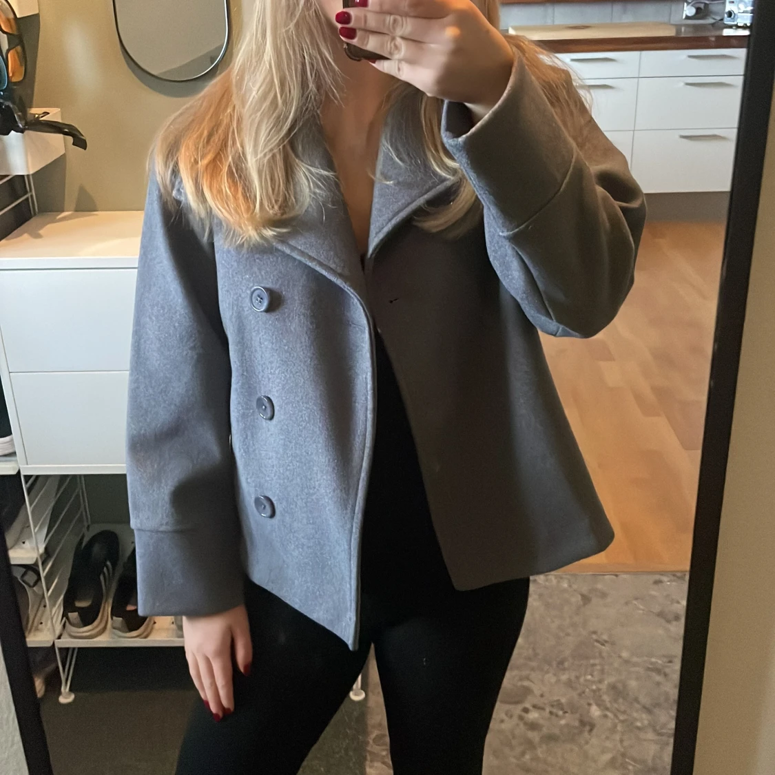 Grå kappa från Gina Tricot