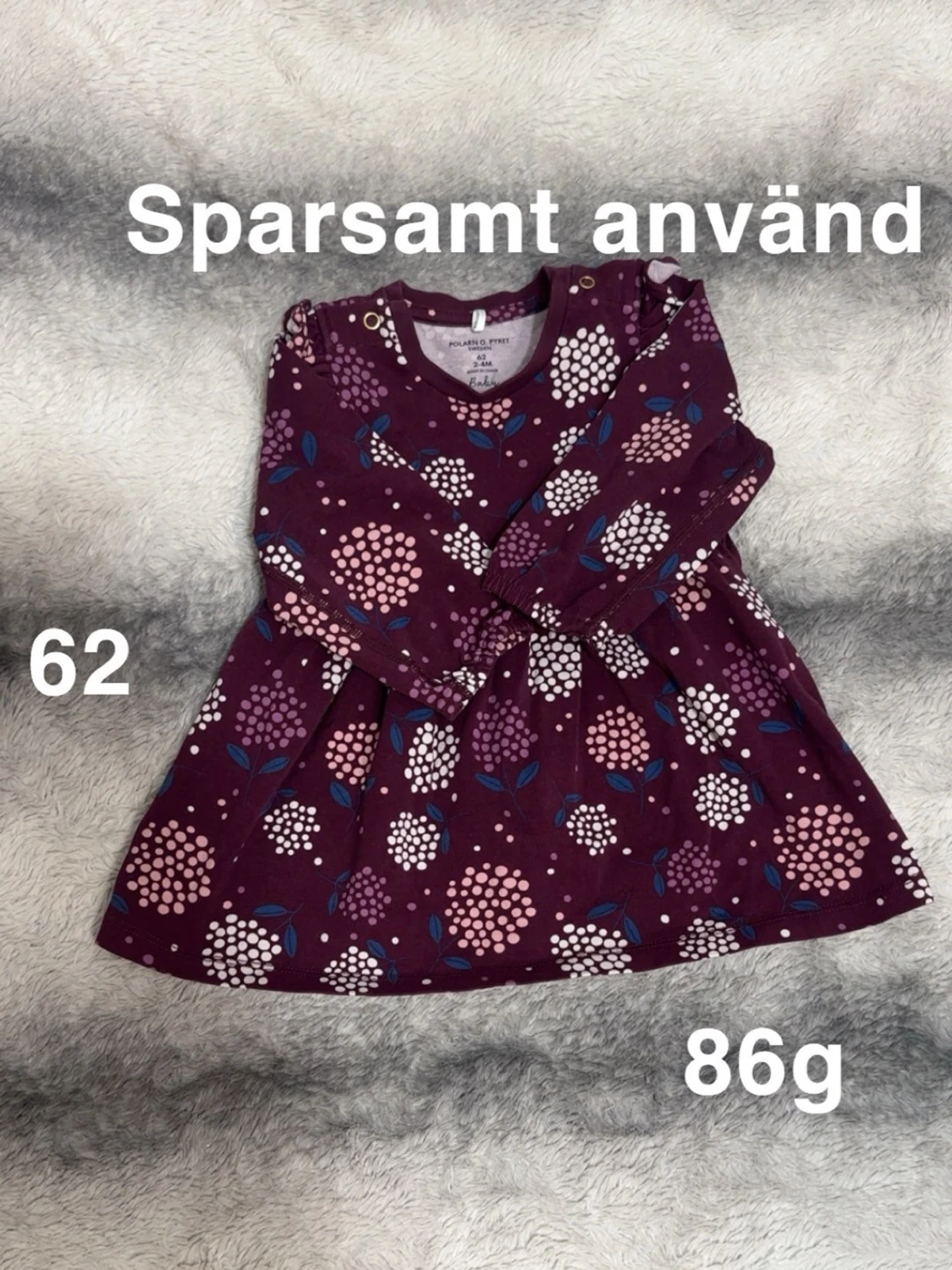 Blommig klänning Polarn O. Pyret