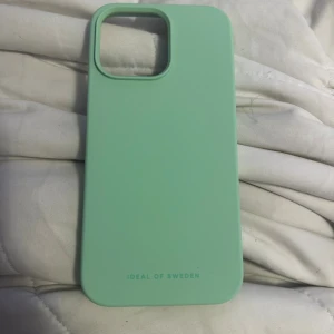 Skal iPhone 14 Pro max - Mintgrönt skal från ideal of sweden till iPhone 14 Pro max, helt nytt aldrig använt, inga defekter 