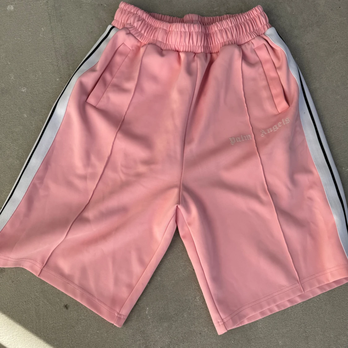 Palm Angels rosa shorts med vita ränder