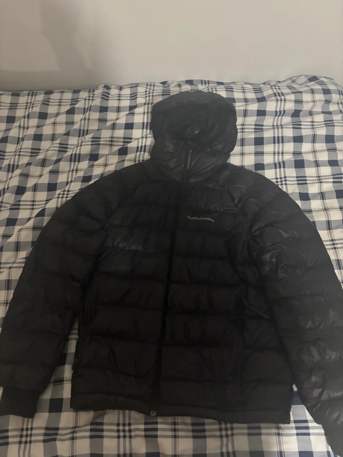 Svart dunjacka Peak Performance