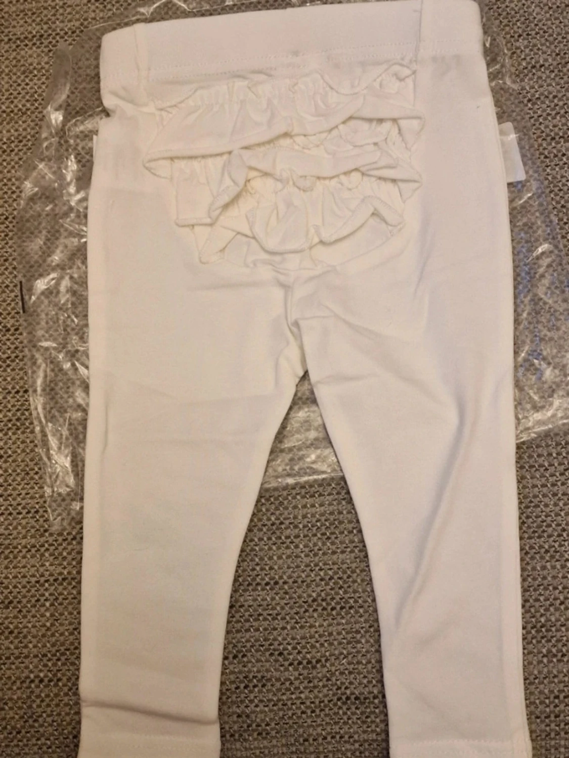 Vita leggings med volang bak - 1