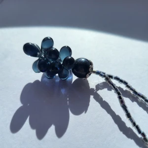 Likely vintage beaded necklce - I purchased this beautiful necklace in either the O0s or 10s. It has a unique beaded design. The beads on the bottom show blue in the light but otherwise look black. The other beads sparkle beautifully in the sun.  Bundle discounts: two items 10% off (automatic) three items 15% off, five items 20% off. Message me before purchasing 3+ items for discount.