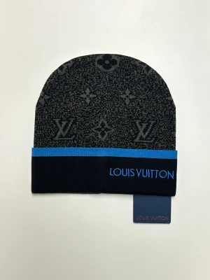 Lv Mössa - Helt ny aldrig använd. Storlek One size. Snabb frakt.