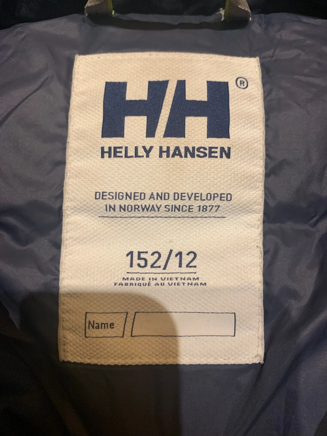 Mörkblå pufferjacka från Helly Hansen - 2