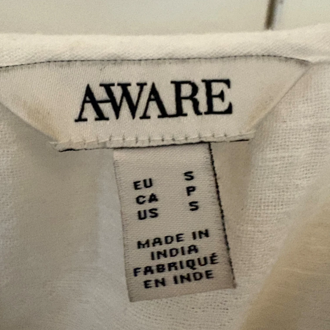 Vit linnetopp från AWARE, stl S - 1