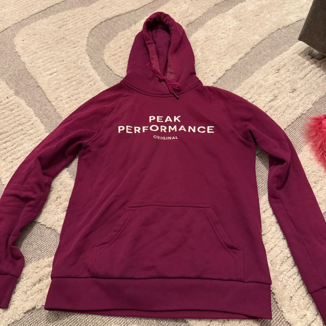 Vinröd hoodie Peak Performance