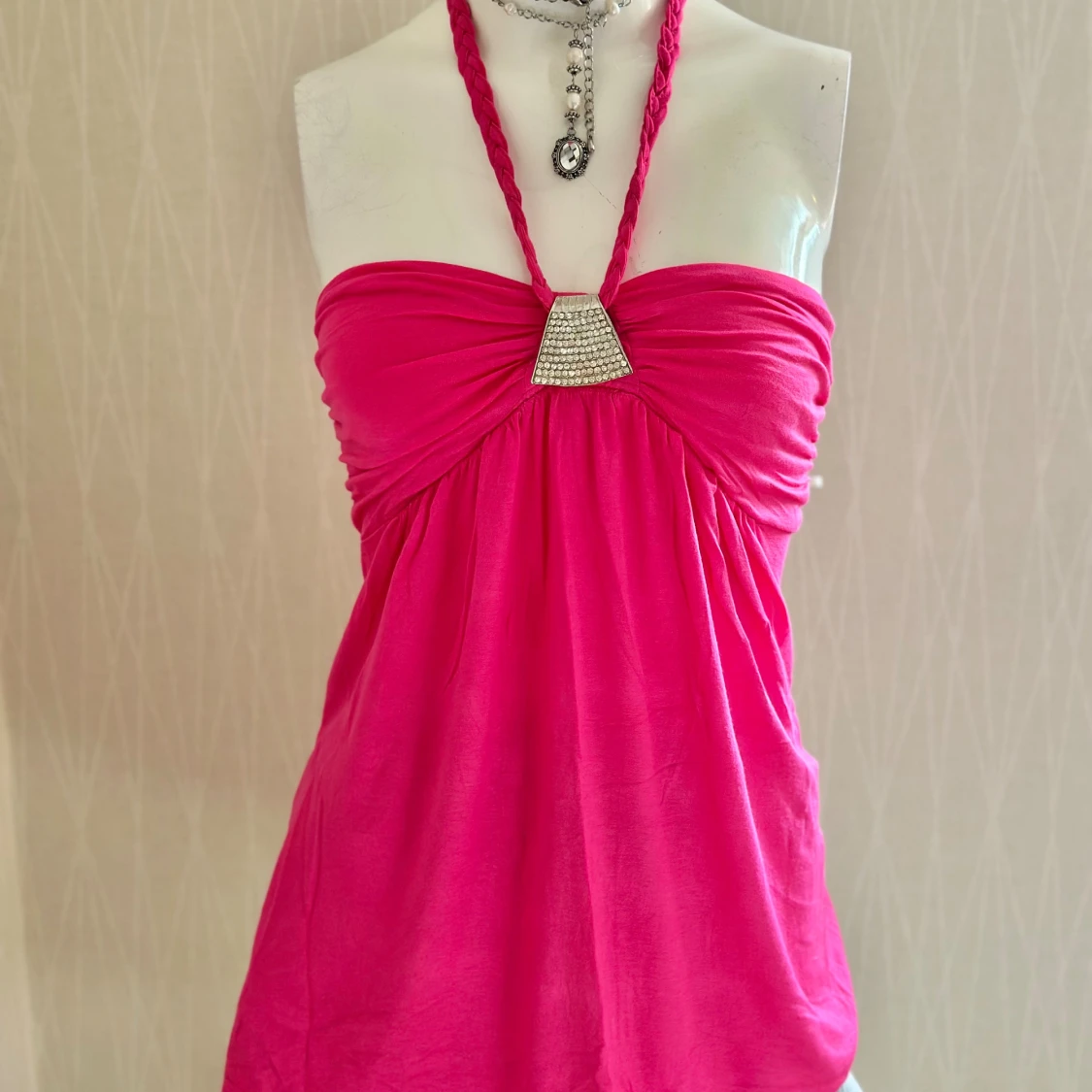 Rosa bandeau topp med strassdetalj