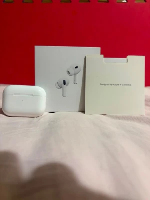 Apple AirPods Pro 2 - AirPods Pro 2 – New & Fully Working 🎧  • Brand new condition • Valid serial number • ANC (Active Noise Cancellation) working perfectly • Transparency Mode working • Charging case included • Charging cable included • Both AirPods work perfectly • Great sound quality • Ready to pair and use  Everything is tested and working. Serious buyers only.